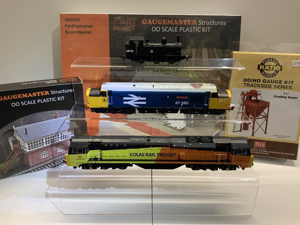 Model locomotives and railway building kits displayed at Uddingston Model Centre.